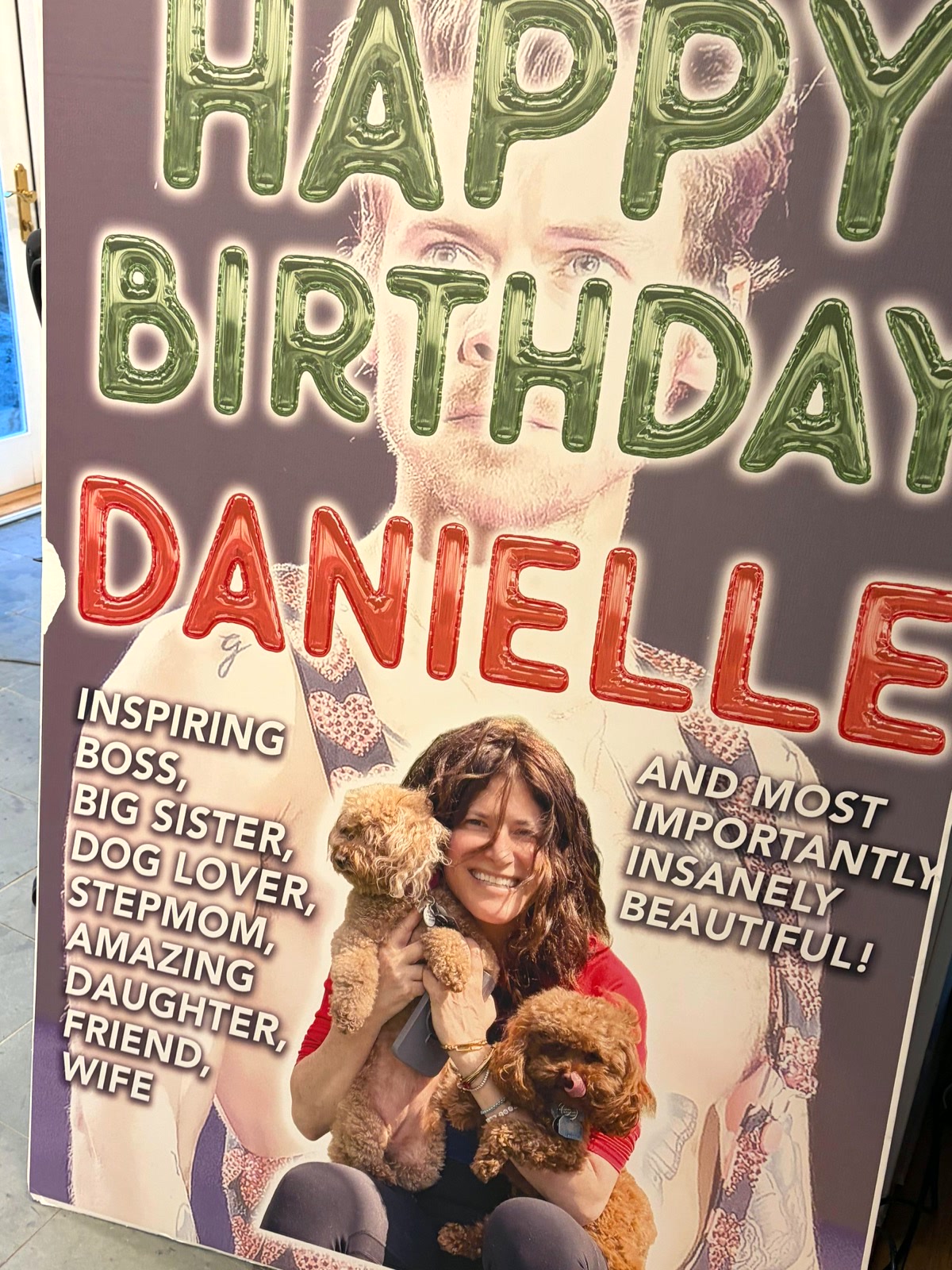 A birthday photo board on a stand